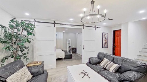 17 Sunset Heights, Cochrane, AB - Indoor Photo Showing Other Room