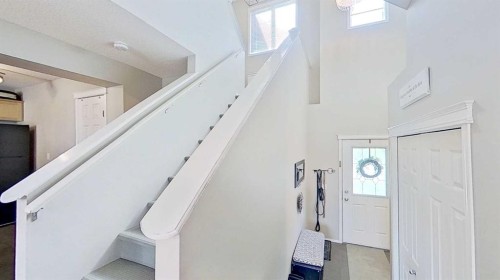 17 Sunset Heights, Cochrane, AB - Indoor Photo Showing Other Room