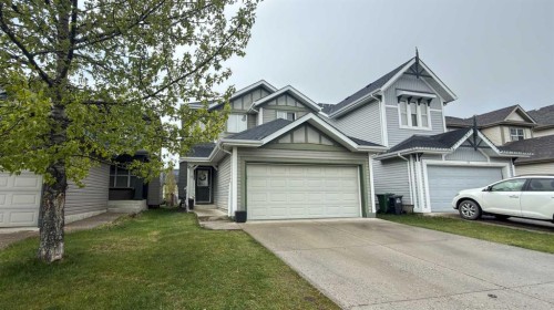 17 Sunset Heights, Cochrane, AB - Outdoor With Facade