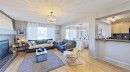 17 Sunset Heights, Cochrane, AB  - Indoor Photo Showing Living Room With Fireplace 