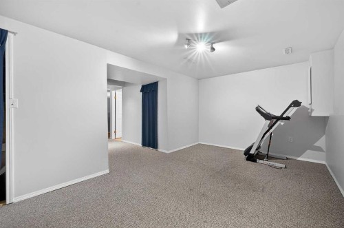 7-14736 Deerfield, Calgary, AB - Indoor Photo Showing Gym Room