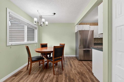 7-14736 Deerfield, Calgary, AB - Indoor Photo Showing Dining Room