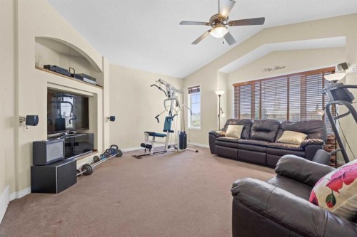 609 Chaparral Drive Se, Calgary, AB - Indoor Photo Showing Gym Room