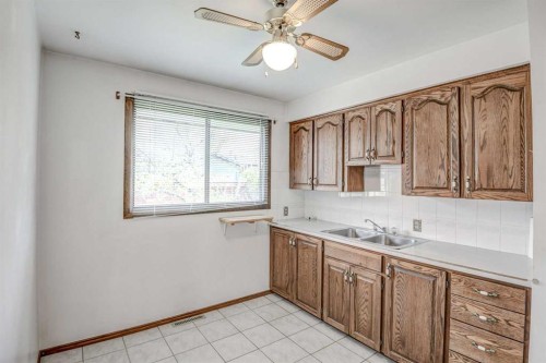 544 Thornhill Place Nw, Calgary, AB - Indoor Photo Showing Kitchen With Double Sink