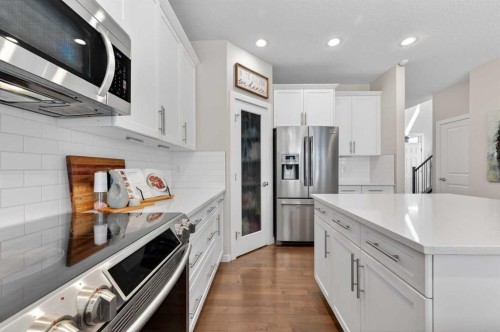 93 Legacy Green Se, Calgary, AB - Indoor Photo Showing Kitchen With Stainless Steel Kitchen With Upgraded Kitchen