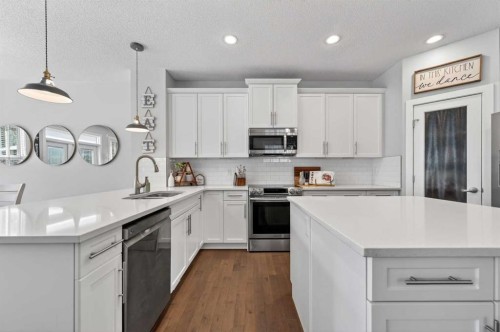 93 Legacy Green Se, Calgary, AB - Indoor Photo Showing Kitchen With Stainless Steel Kitchen With Upgraded Kitchen