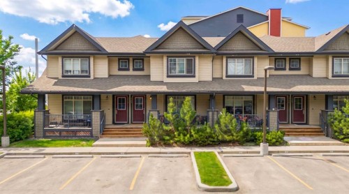 1311-121 Copperpond Common North, Calgary, AB - Outdoor With Deck Patio Veranda With Facade