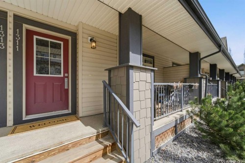 1311-121 Copperpond Common North, Calgary, AB - Outdoor With Deck Patio Veranda With Exterior
