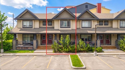 1311-121 Copperpond Common North, Calgary, AB - Outdoor With Deck Patio Veranda With Facade