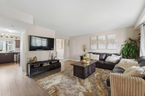 1311-121 Copperpond Common North, Calgary, AB - Indoor Photo Showing Living Room