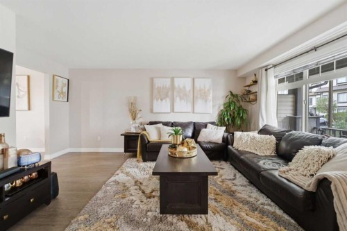 1311-121 Copperpond Common North, Calgary, AB - Indoor Photo Showing Living Room