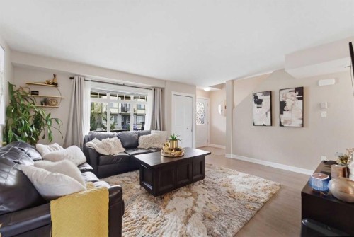 1311-121 Copperpond Common North, Calgary, AB - Indoor Photo Showing Living Room