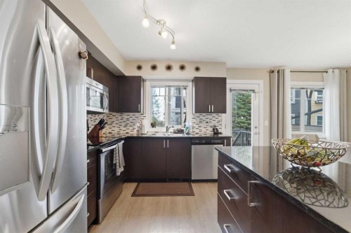 1311-121 Copperpond Common North, Calgary, AB - Indoor Photo Showing Kitchen With Upgraded Kitchen