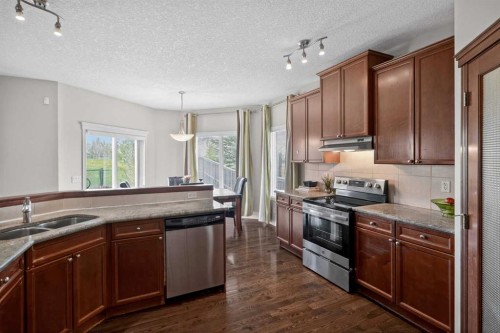 32 Evanspark Circle Nw, Calgary, AB - Indoor Photo Showing Kitchen With Stainless Steel Kitchen With Double Sink