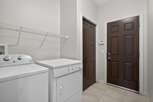 32 Evanspark Circle Nw, Calgary, AB - Indoor Photo Showing Laundry Room
