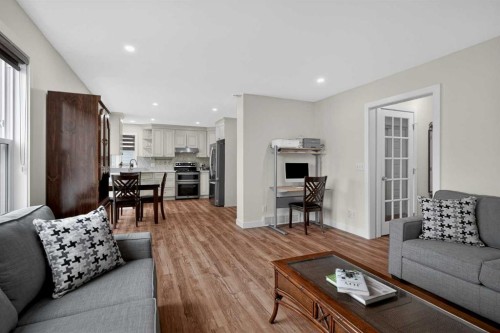 84 Shawbrooke Circle Sw, Calgary, AB - Indoor Photo Showing Living Room
