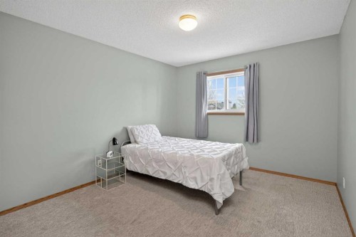 84 Shawbrooke Circle Sw, Calgary, AB - Indoor Photo Showing Bedroom