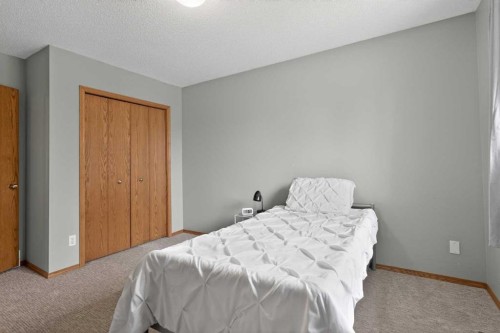 84 Shawbrooke Circle Sw, Calgary, AB - Indoor Photo Showing Bedroom