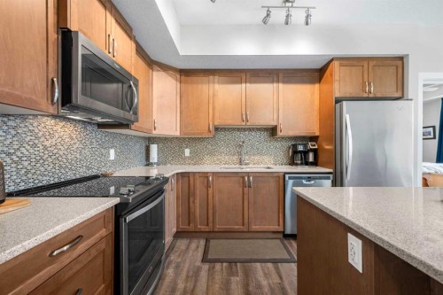 1412-3727 Sage Hill Drive Nw, Calgary, AB - Indoor Photo Showing Kitchen With Stainless Steel Kitchen With Upgraded Kitchen