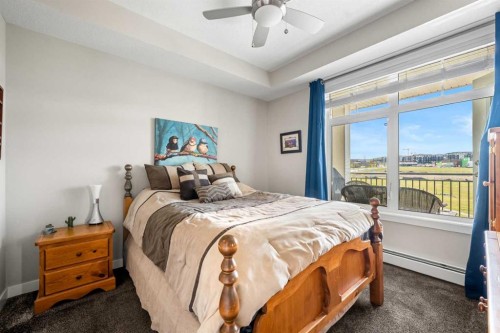 1412-3727 Sage Hill Drive Nw, Calgary, AB - Indoor Photo Showing Bedroom