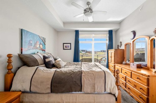 1412-3727 Sage Hill Drive Nw, Calgary, AB - Indoor Photo Showing Bedroom