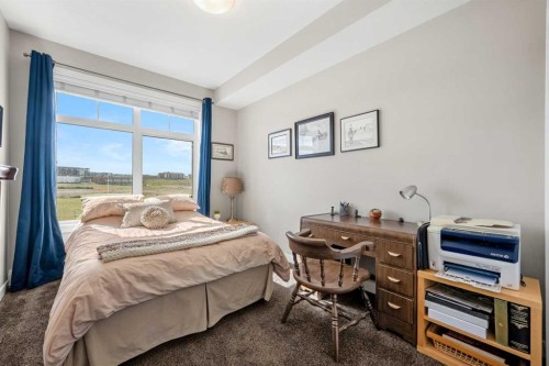 1412-3727 Sage Hill Drive Nw, Calgary, AB - Indoor Photo Showing Bedroom