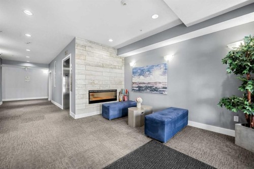 1412-3727 Sage Hill Drive Nw, Calgary, AB - Indoor With Fireplace