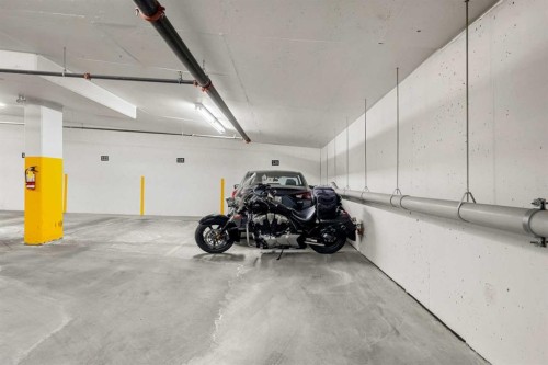 1412-3727 Sage Hill Drive Nw, Calgary, AB - Indoor Photo Showing Garage