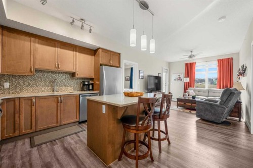 1412-3727 Sage Hill Drive Nw, Calgary, AB - Indoor Photo Showing Kitchen With Stainless Steel Kitchen