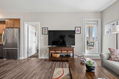 1412-3727 Sage Hill Drive Nw, Calgary, AB - Indoor Photo Showing Living Room
