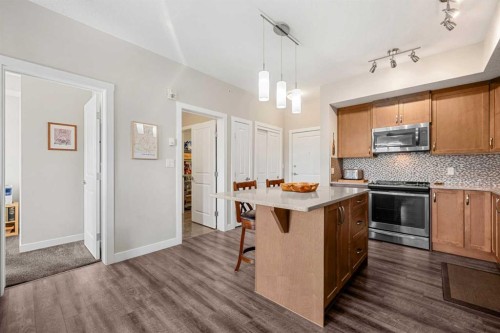1412-3727 Sage Hill Drive Nw, Calgary, AB - Indoor Photo Showing Kitchen
