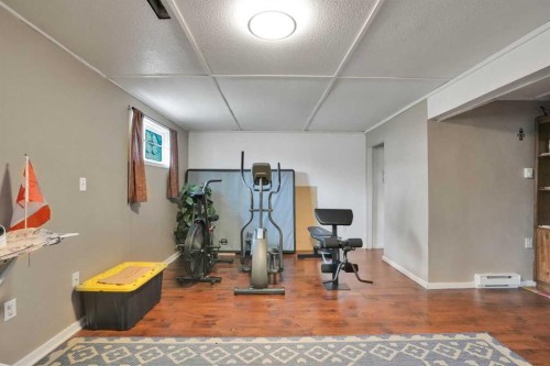 32 Taraglen Place Ne, Calgary, AB - Indoor Photo Showing Gym Room