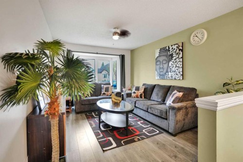 32 Taraglen Place Ne, Calgary, AB - Indoor Photo Showing Living Room