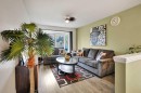 32 Taraglen Place Ne, Calgary, AB  - Indoor Photo Showing Living Room 