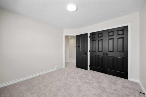 21 Douglas Woods Manor Se, Calgary, AB - Indoor Photo Showing Other Room