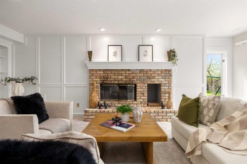 21 Douglas Woods Manor Se, Calgary, AB - Indoor Photo Showing Living Room With Fireplace