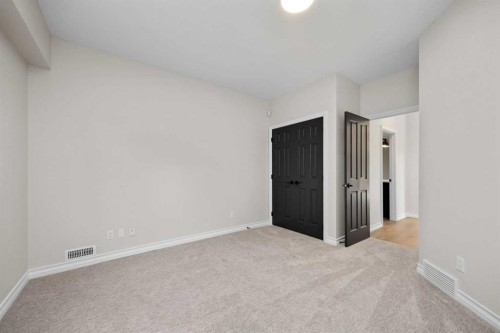 21 Douglas Woods Manor Se, Calgary, AB - Indoor Photo Showing Other Room