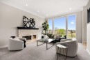 21 Douglas Woods Manor Se, Calgary, AB  - Indoor Photo Showing Living Room With Fireplace 