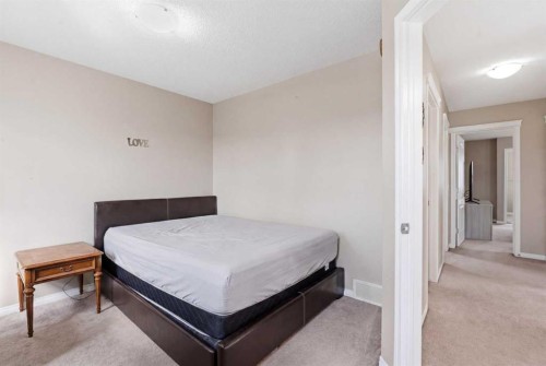246 Martinwood Place Ne, Calgary, AB - Indoor Photo Showing Bedroom