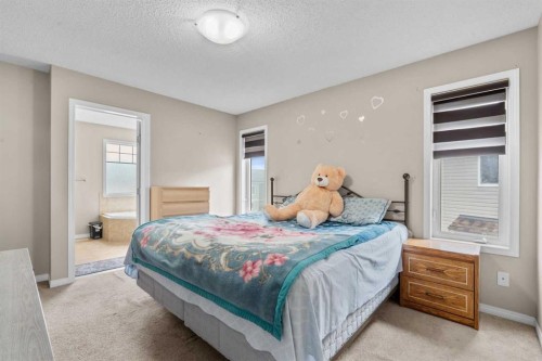 246 Martinwood Place Ne, Calgary, AB - Indoor Photo Showing Bedroom