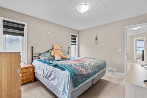 246 Martinwood Place Ne, Calgary, AB - Indoor Photo Showing Bedroom