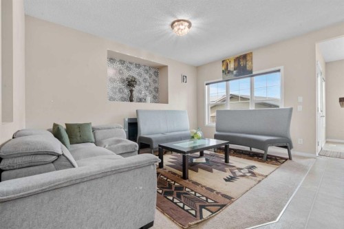 246 Martinwood Place Ne, Calgary, AB - Indoor Photo Showing Living Room