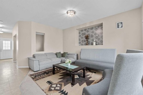 246 Martinwood Place Ne, Calgary, AB - Indoor Photo Showing Living Room
