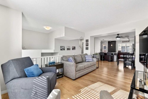 312 New Brighton Villas Se, Calgary, AB - Indoor Photo Showing Living Room