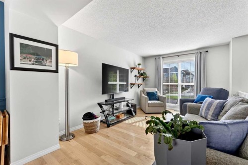 312 New Brighton Villas Se, Calgary, AB - Indoor Photo Showing Living Room