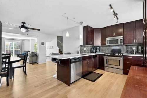 312 New Brighton Villas Se, Calgary, AB - Indoor Photo Showing Kitchen With Stainless Steel Kitchen