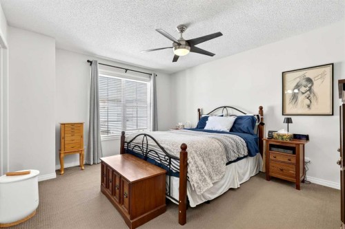 312 New Brighton Villas Se, Calgary, AB - Indoor Photo Showing Bedroom