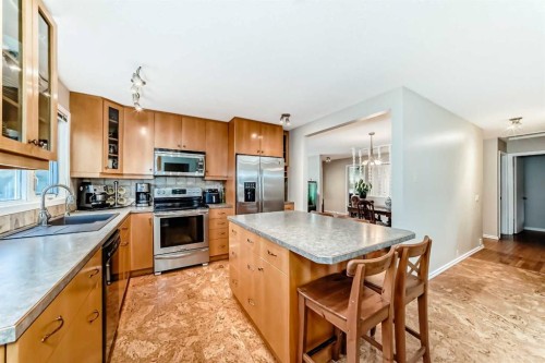 308 Cannington Place Sw, Calgary, AB - Indoor Photo Showing Kitchen With Stainless Steel Kitchen With Double Sink