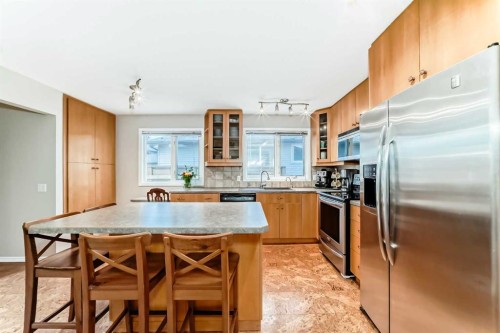 308 Cannington Place Sw, Calgary, AB - Indoor Photo Showing Kitchen With Stainless Steel Kitchen With Double Sink