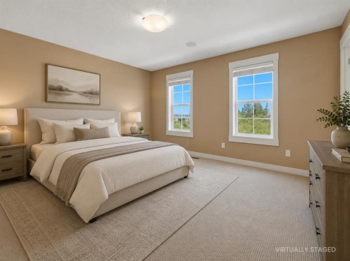320 Rainbow Falls Drive, Chestermere, AB - Indoor Photo Showing Bedroom